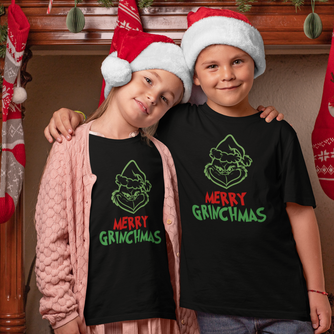 Grinch Inspired Face Merry Grinchmas Kids Holiday T-Shirt In Black Color. Gift idea for your kids, nephew, nieces, and kids on your block.  Merry Christmas