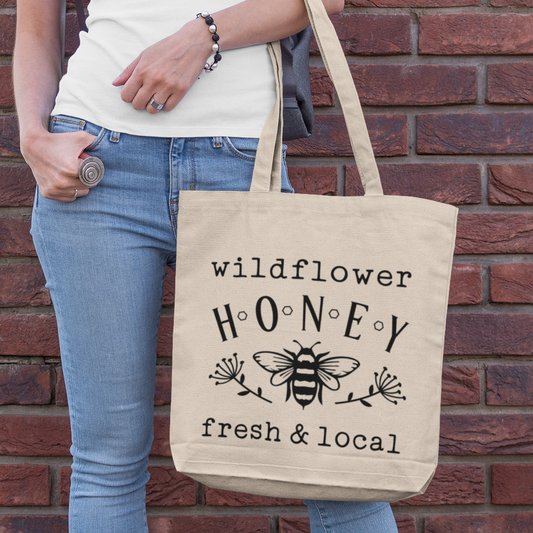 Wildflower honey Reusable eco-friendly farmers market tote bag with a spacious design, perfect for shopping fresh produce and supporting sustainable living. Gift idea for college students, moms, health & wellness enthusiasts, environmentally conscious shoppers, and local farmer's market shoppers!