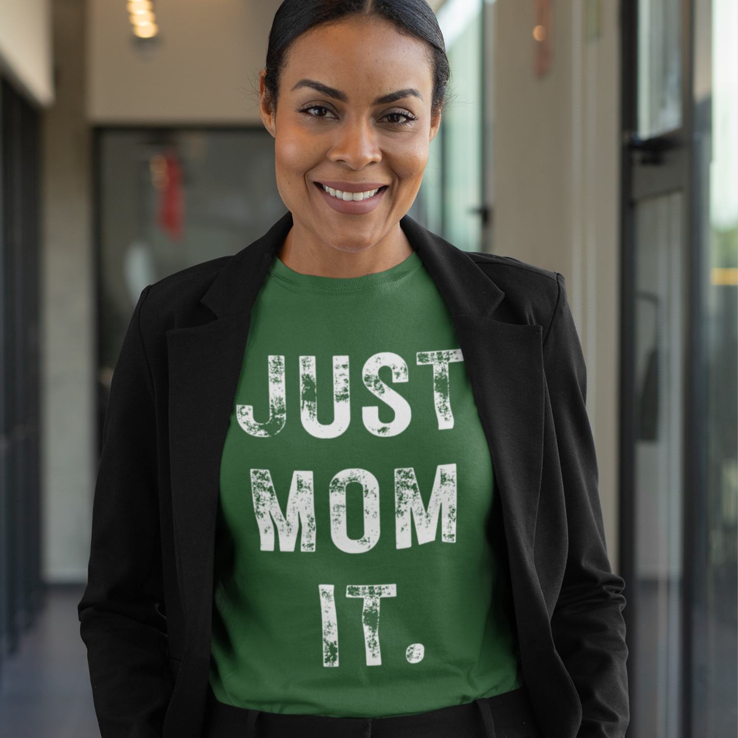 Just Mom Empower Tee featuring empowering text for modern moms. Soft cotton shirt with a stylish design, available in various sizes and colors.