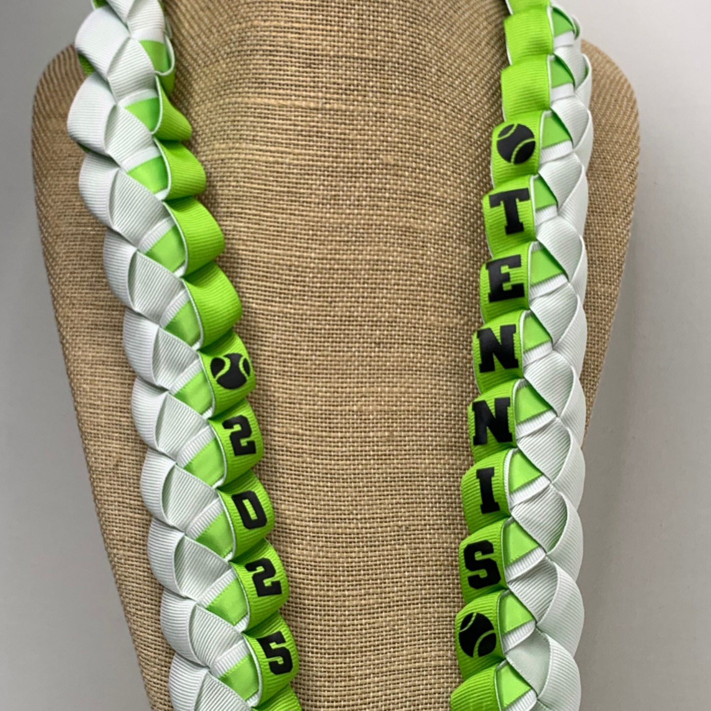 Custom football senior night ribbon leis, personalized with athlete's name and jersey number for a unique graduation gift for your player or the entire team!