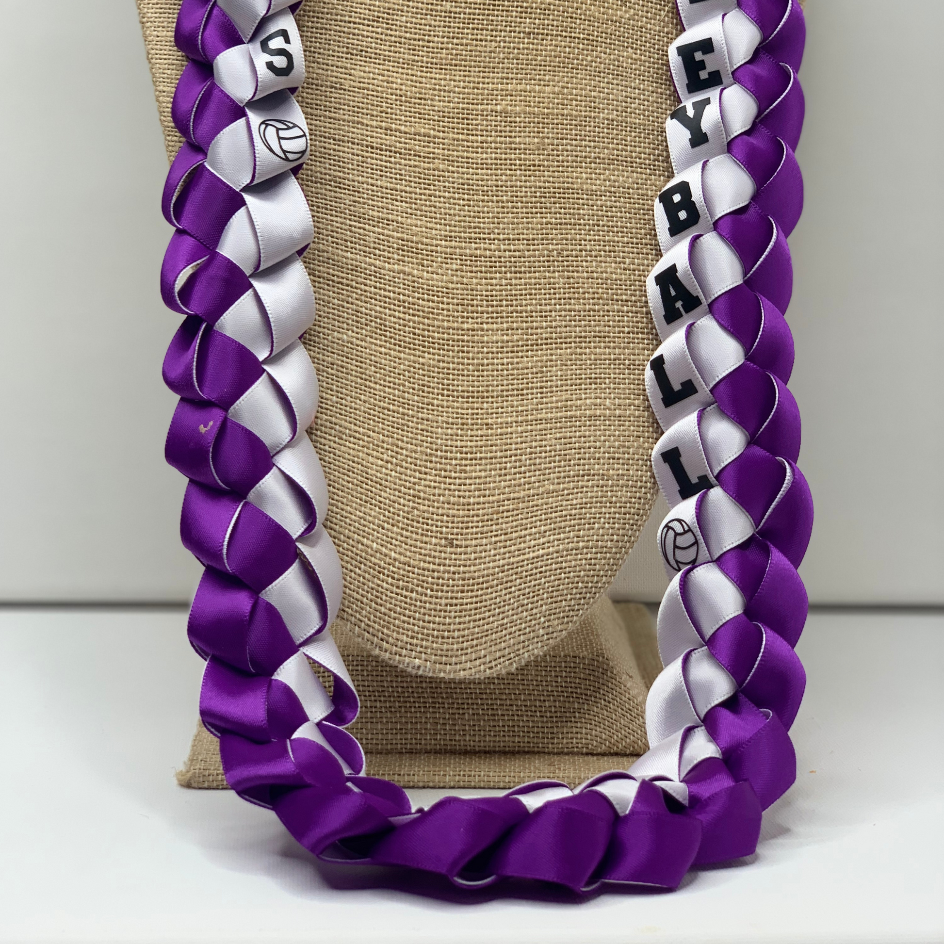 Custom volleyball senior night ribbon leis, personalized with athlete's name and jersey number for a unique graduation gift for your player or the entire team!